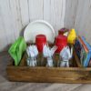 Grill Mate table caddy filled with condiments and utensils