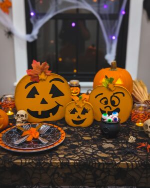 Jack-O-Lantern Pumpkins displayed on a festive Halloween table