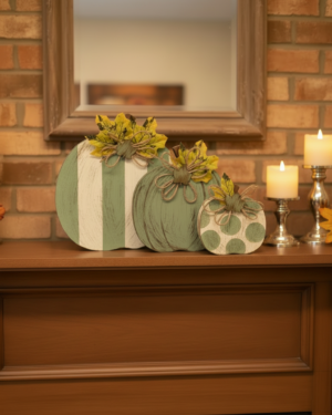 Green Pumpkins sitting on a mantel